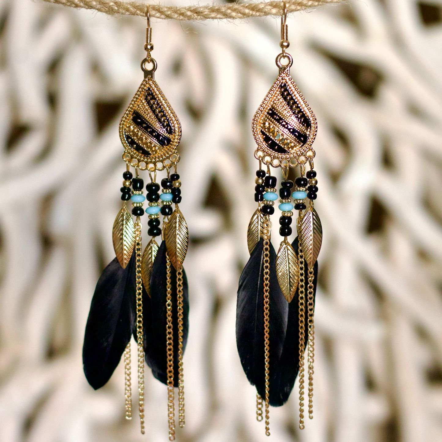 Bohemian-style black feather earrings