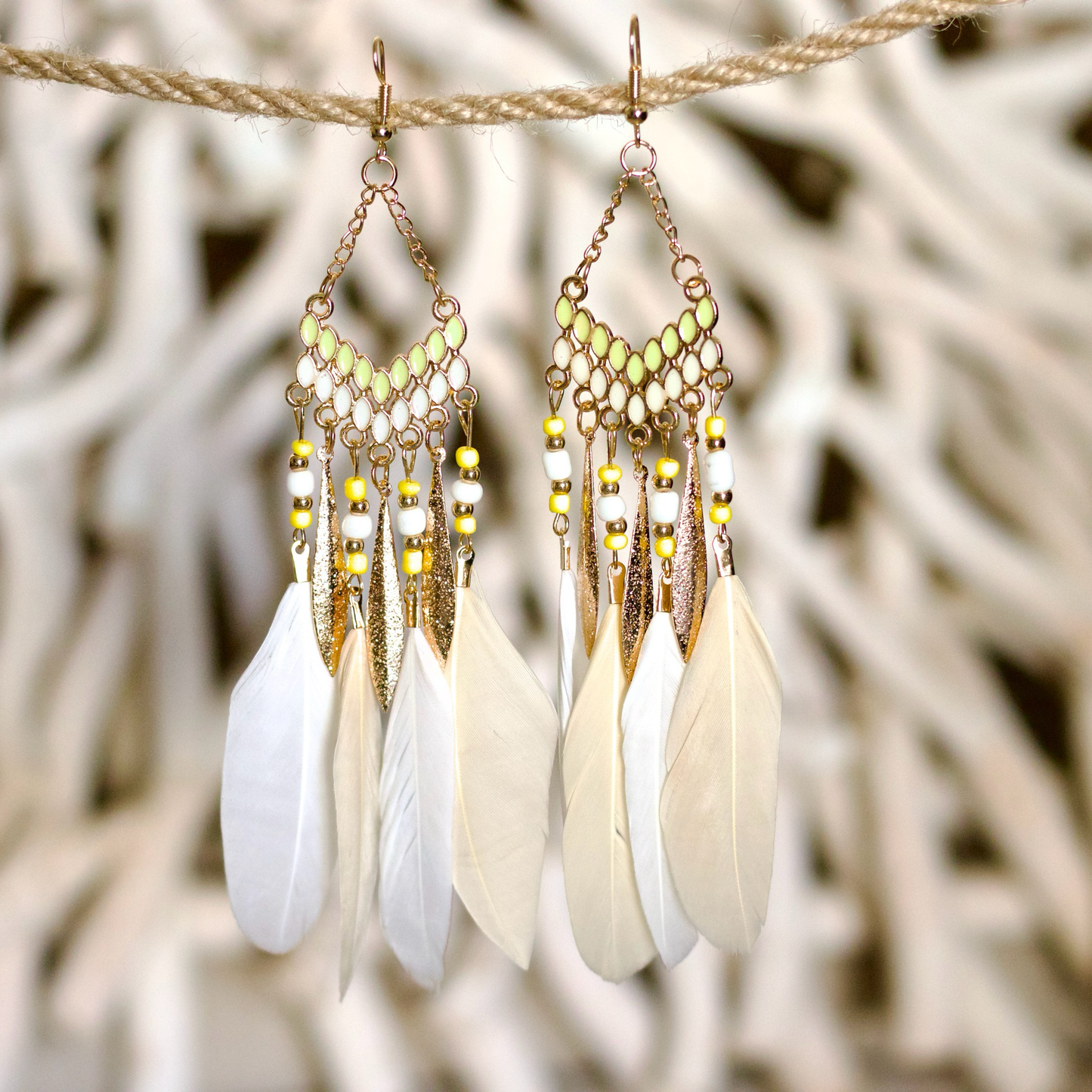Bohemian-style statement white feather earrings