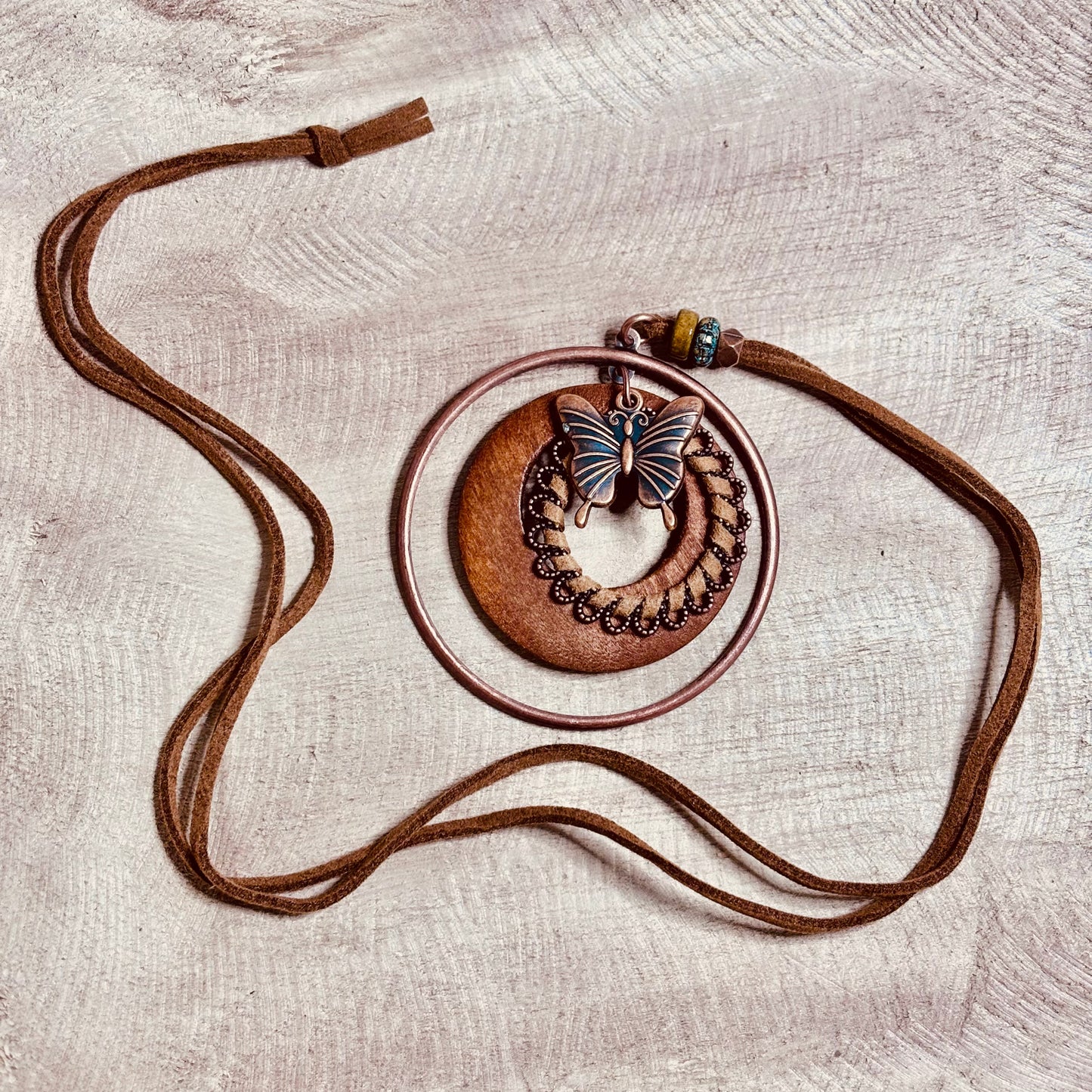 Woodland Flight Necklace – Butterfly Charm & Rustic Layers