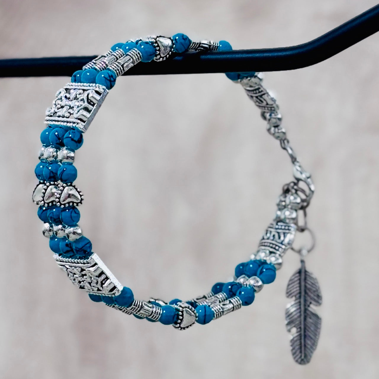 Turquoise Feather Charm Bracelet – Detailed & Textured