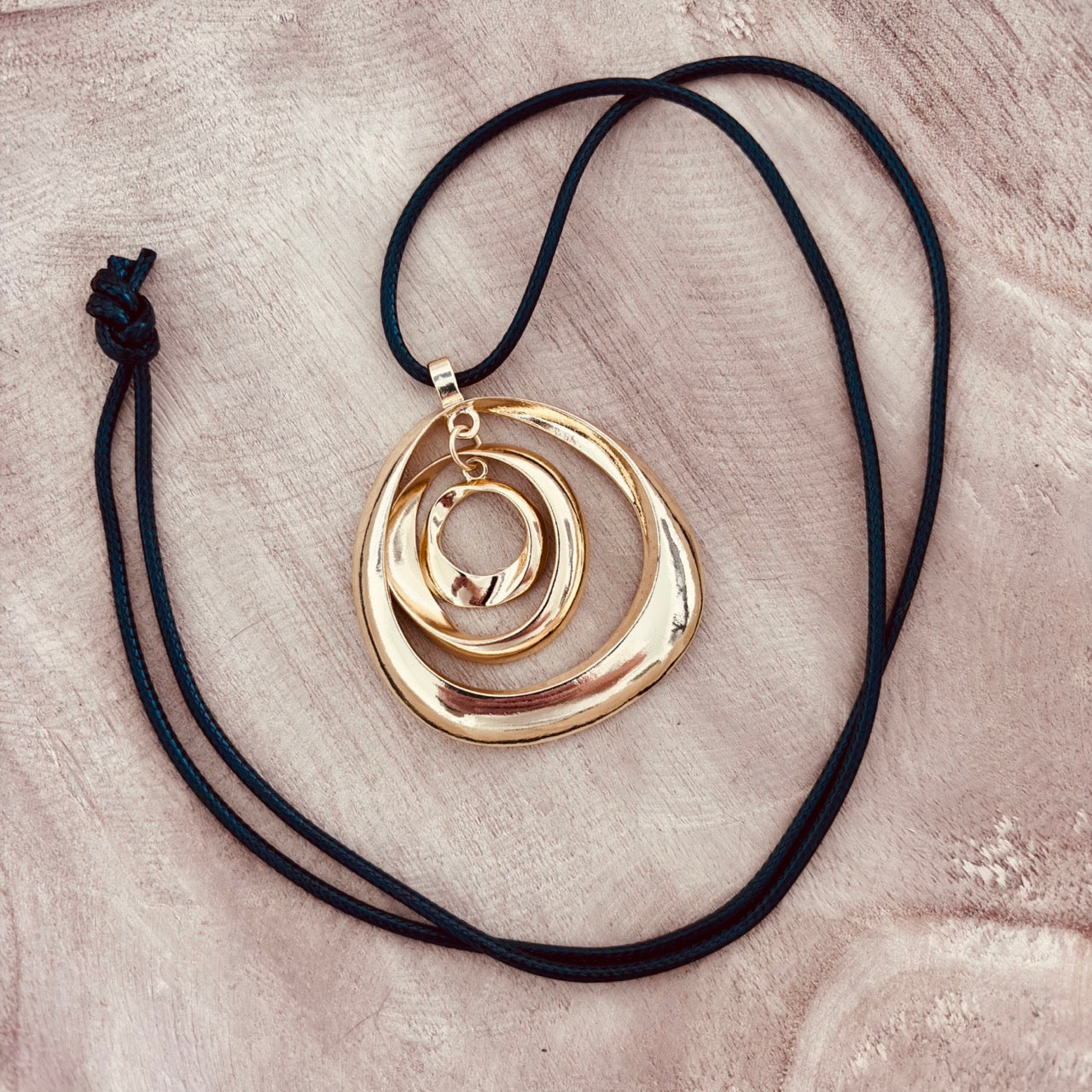 Golden Orbit Pendant – Modern & Radiant