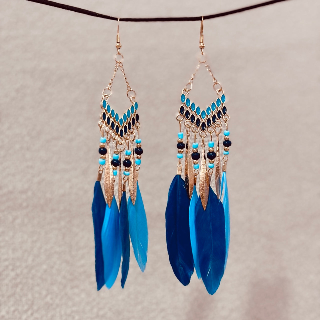 Blue Feather Statement Earrings – Bold & Bohemian