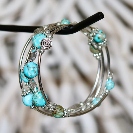 Blue Emperor Stone Layered Bracelet with Spiral Charm – Regal & Serene
